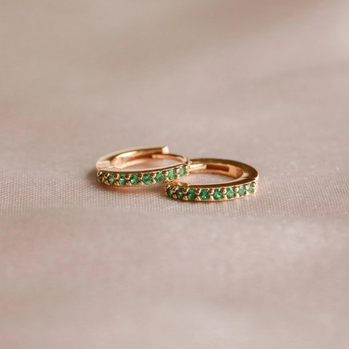 May Birthstone Huggie Earrings